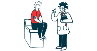 A medical professional speaks with a patient.