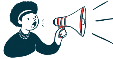 A person uses a megaphone to make an announcement.