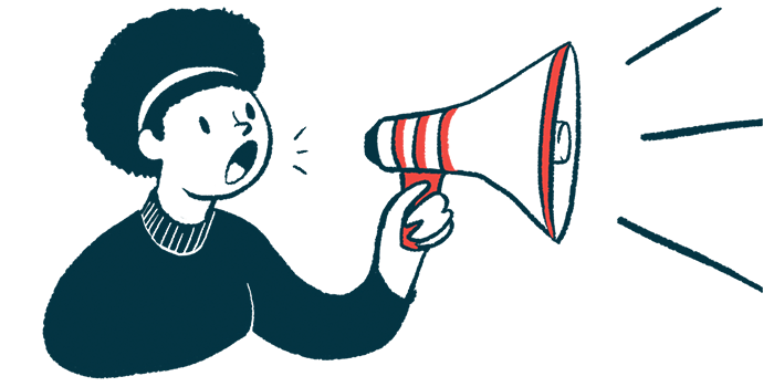 A person uses a megaphone to make an announcement.