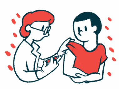 A person receives an injection in the arm from a doctor.