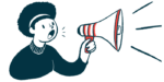 A person speaks into a megaphone.