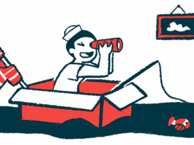 A child wearing a sailor's hat looks through a telescope while sitting in a boat made from a cardboard box.