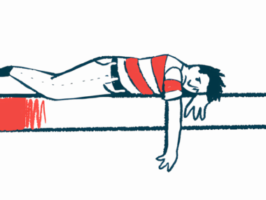 A frowning person lies on a bed with one arm hanging over the edge.