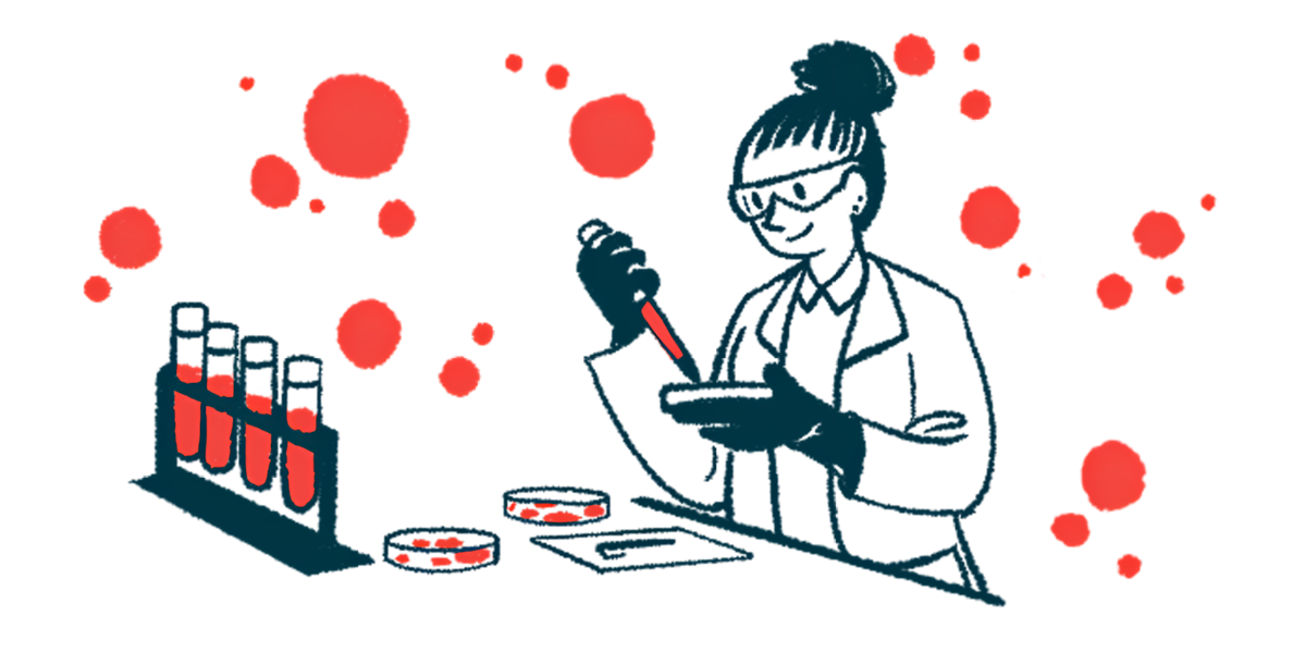 A scientist works with a petri dish in a laboratory alongside a rack of filled vials.