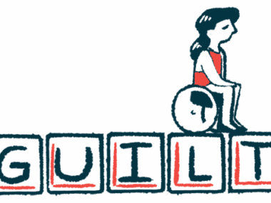 A woman sits on a stool on top of a block of letters that spell 