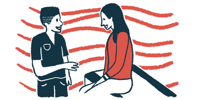 A woman sitting on an exam table is in conversation with a healthcare professional.